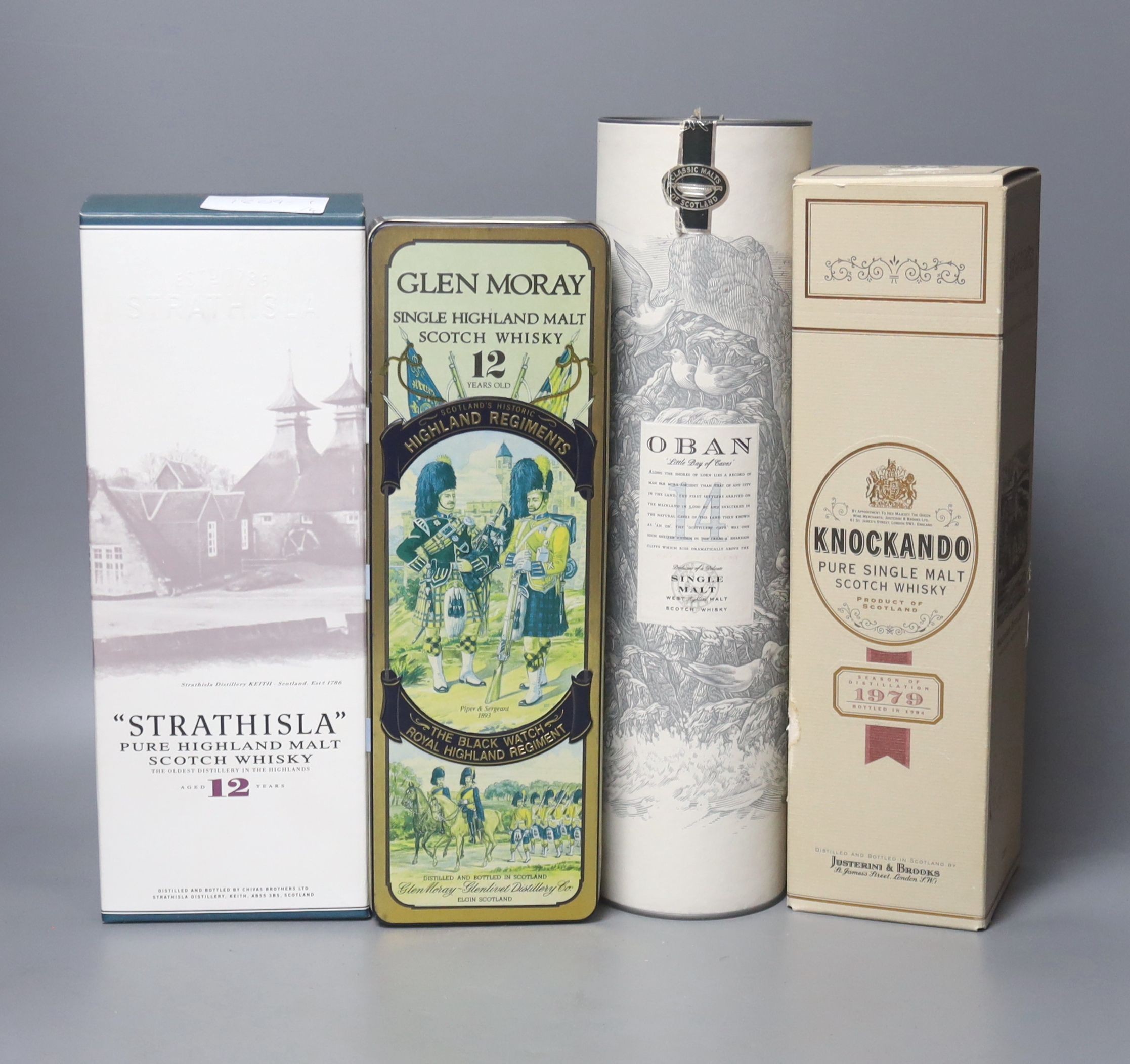 Four assorted malt whiskies- A bottle of Strathisla 12 year old, Glen Moray 12 year old, Oban and Knockando, (4)